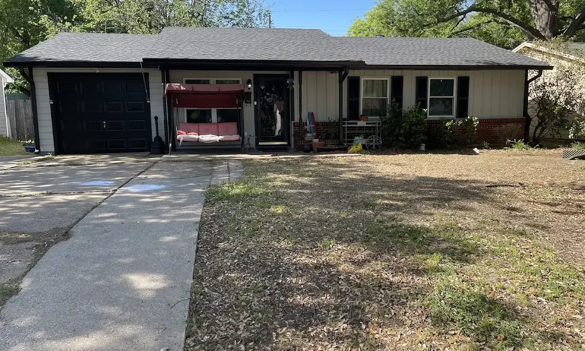 Asphalt Shingle Roof Repair crew at work on a residential roof in Dallas